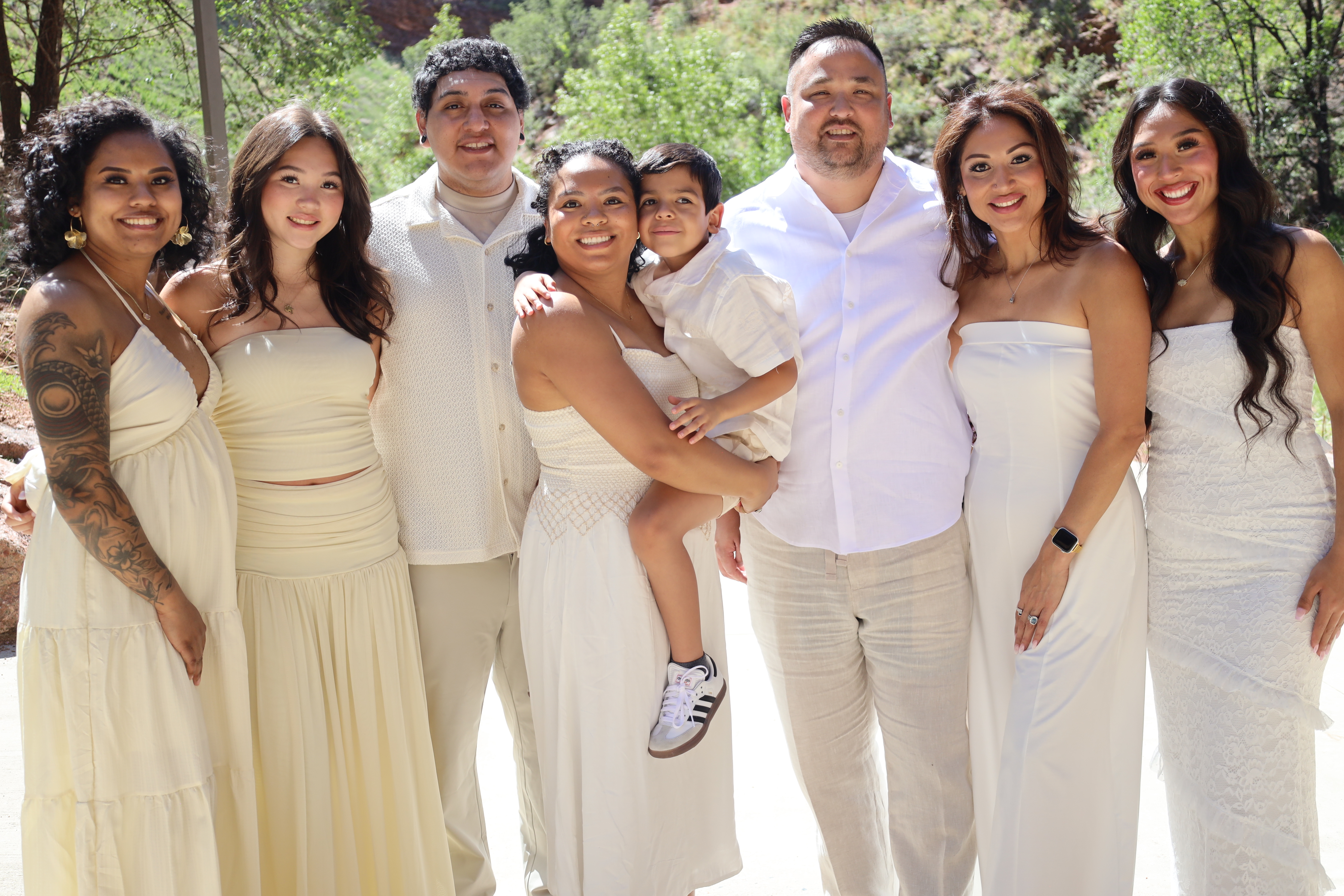 Family of eight in cream at the canyon path