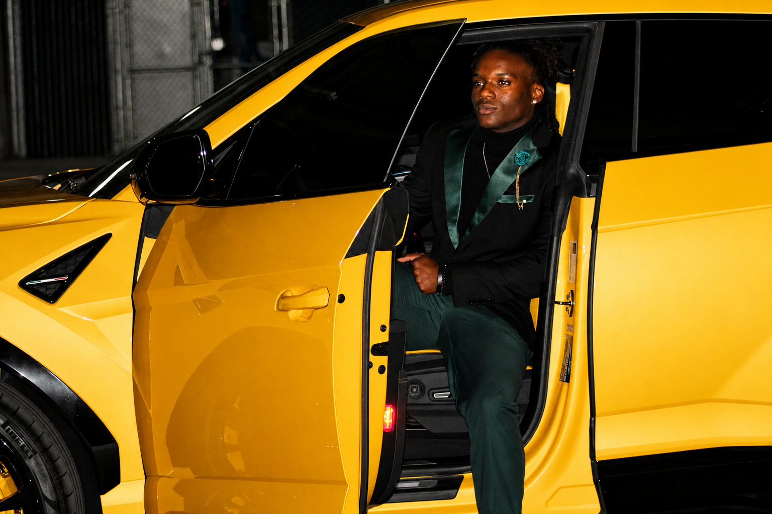 Prom arrival · emerald-trim tuxedo stepping out of yellow Lamborghini