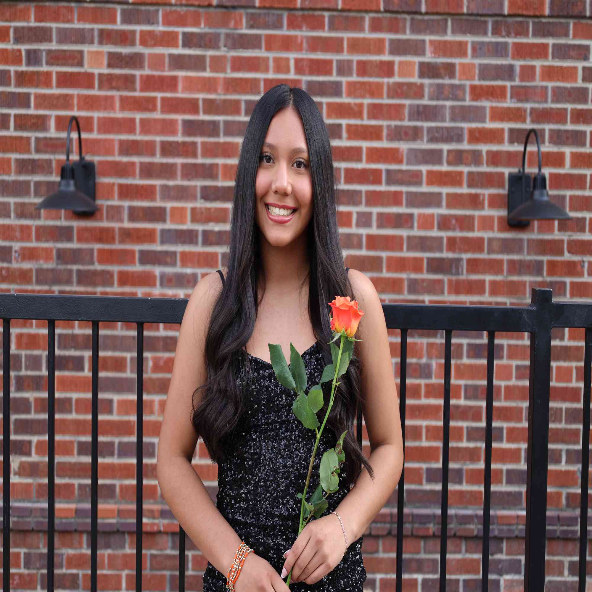 HOCO portrait in black sequins with single rose