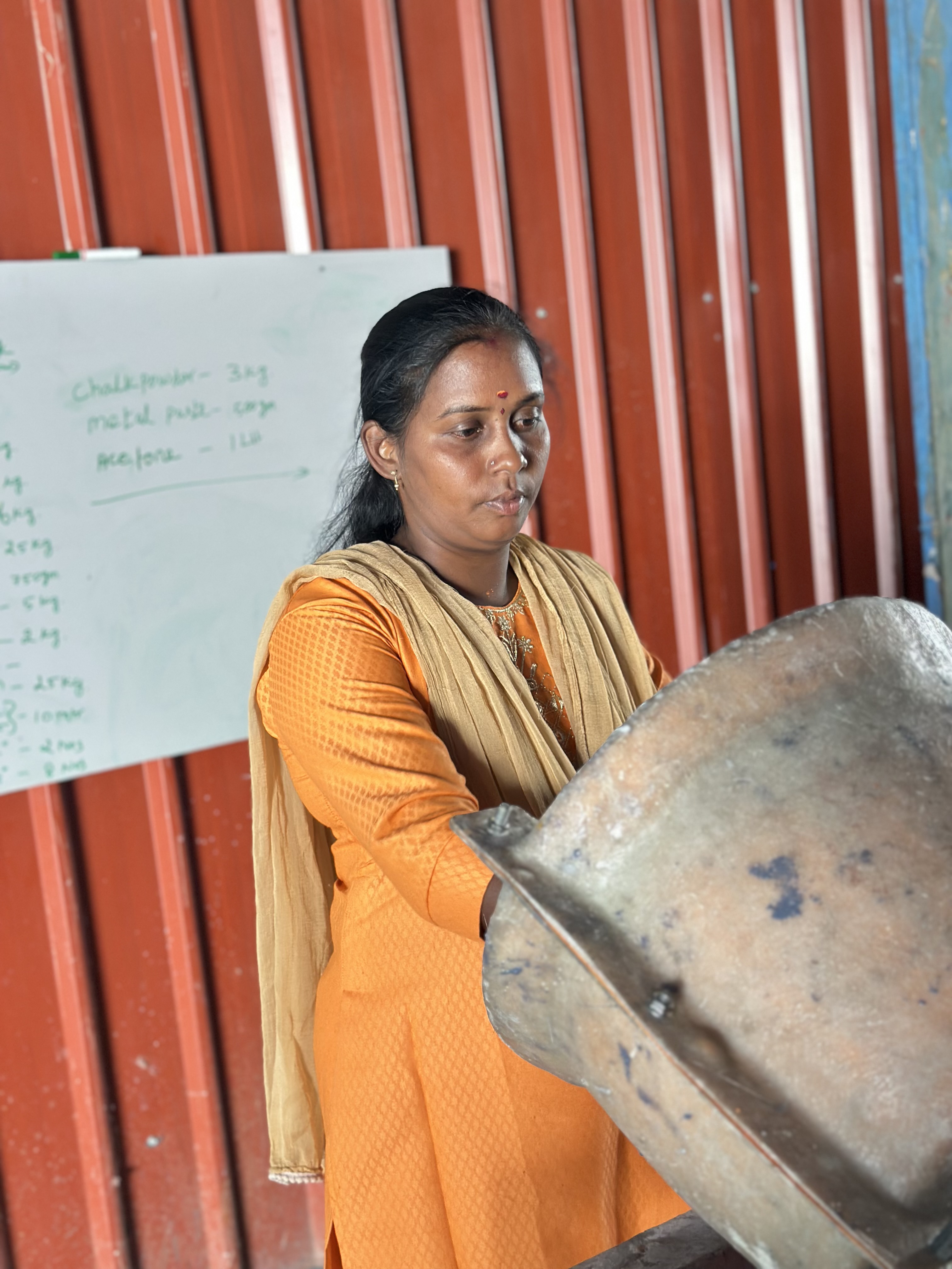 Woman working with planter mould