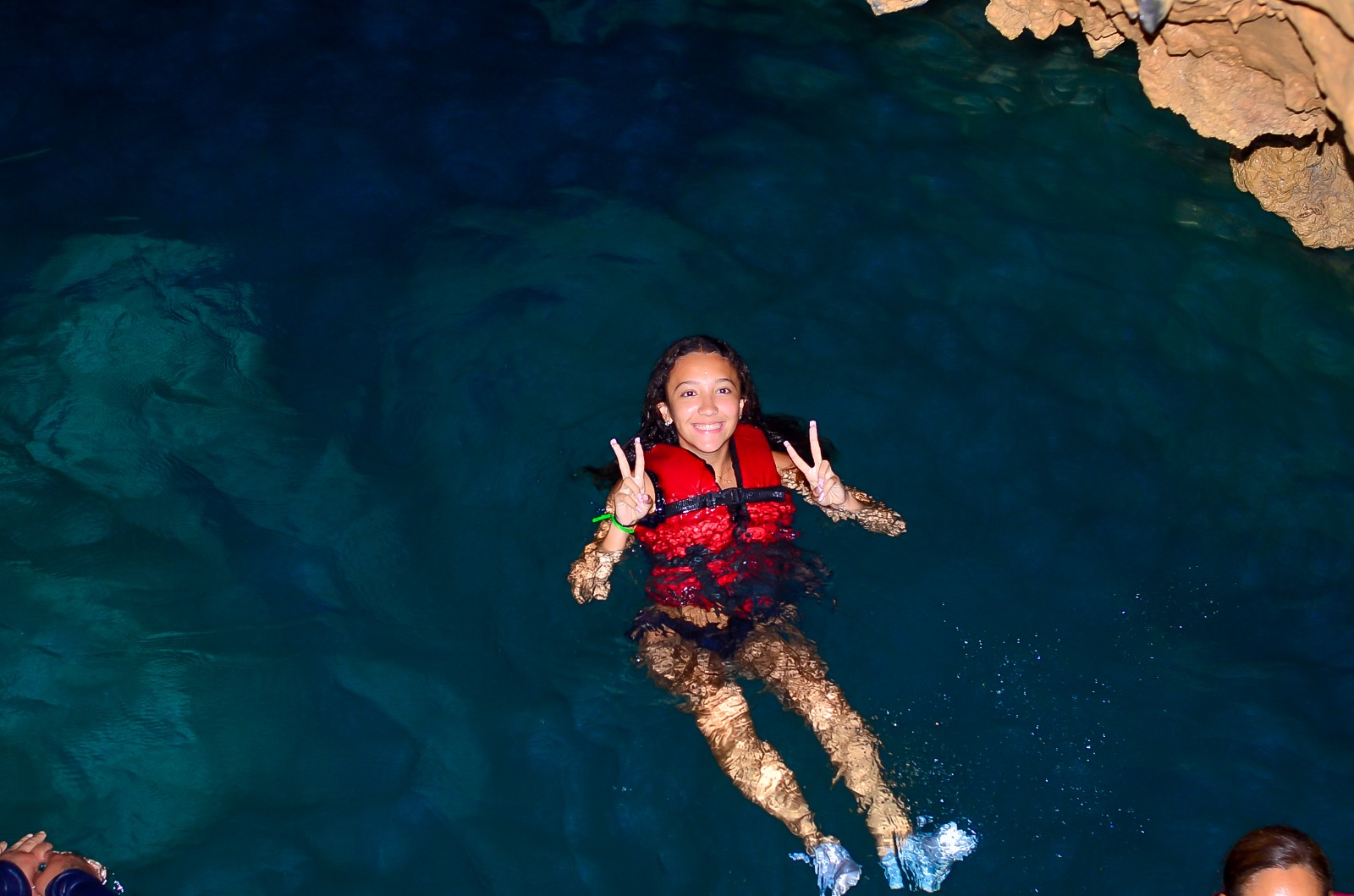 Swimming in natural cave buggy tour stop in Punta Cana