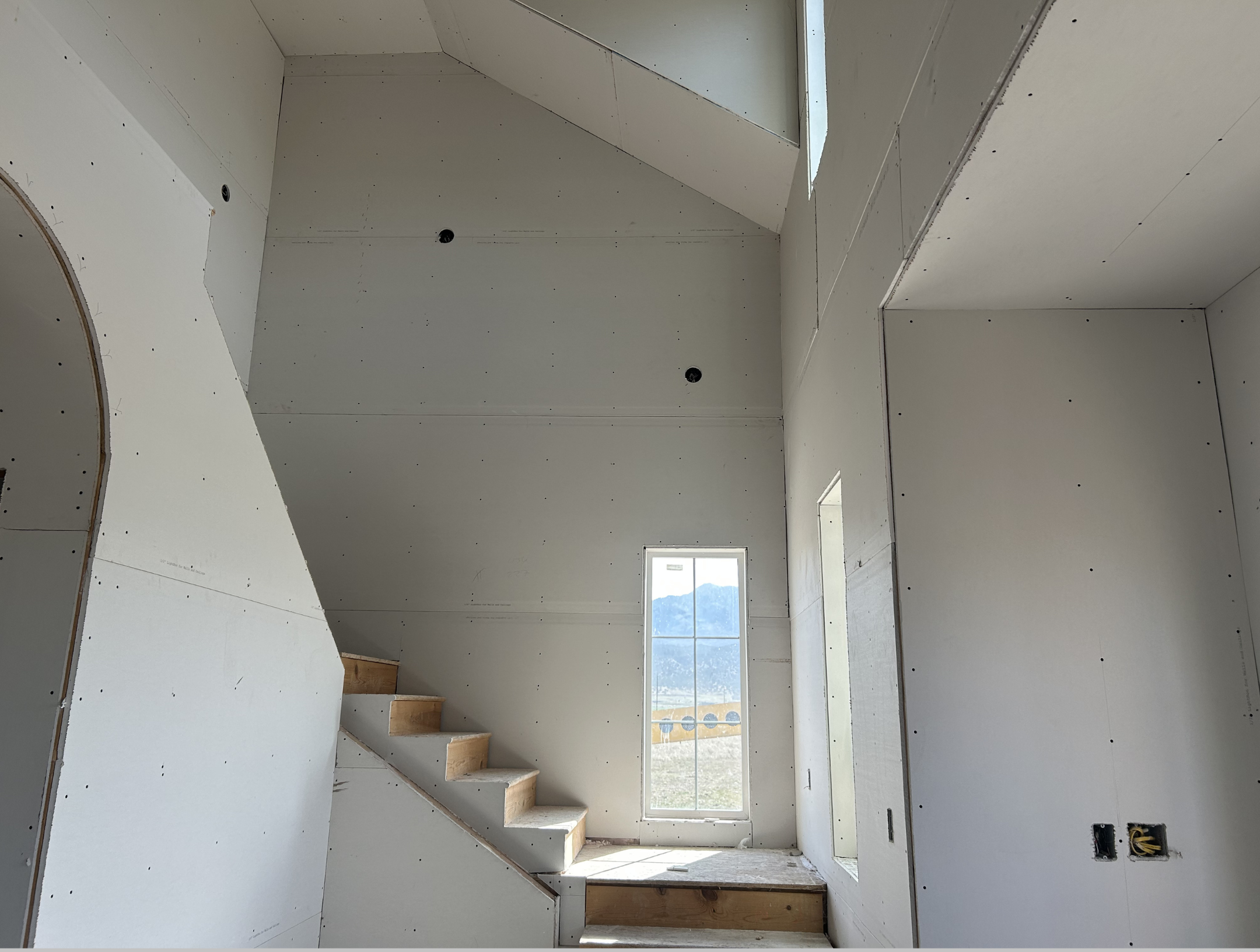 Staircase and drywall installation by JV Home Renovation
