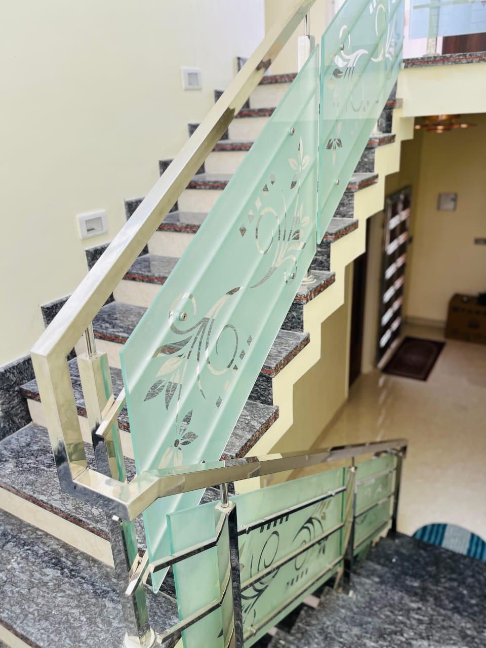 Staircase railings Chennai SS handrail with glass panels by Ramdev Steel