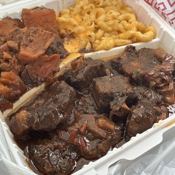 Rainey's signature slow-braised oxtails with homemade sides