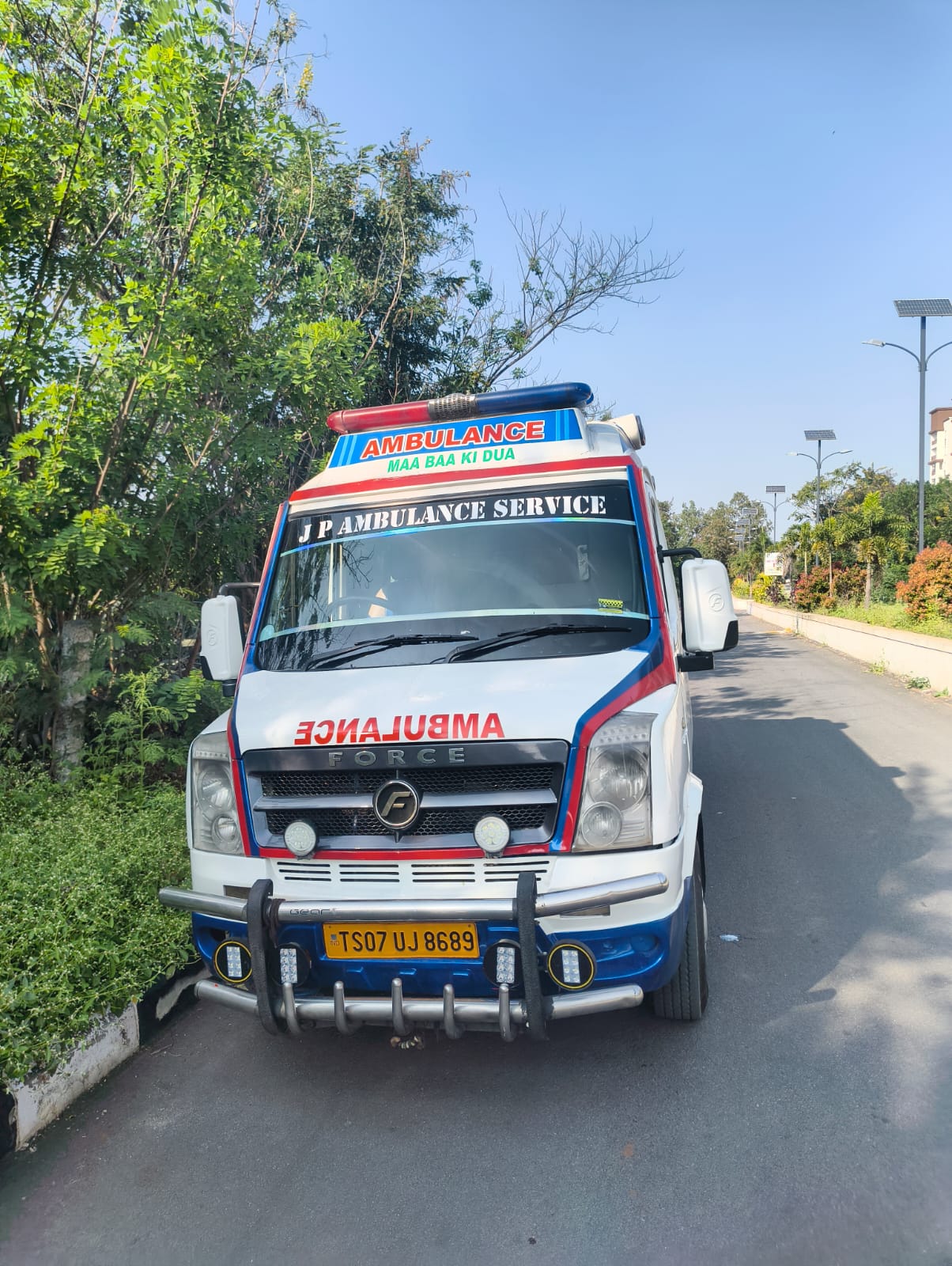 Outstation ambulance Hyderabad — AC ALS Force Traveller ambulance ready for interstate patient transfer