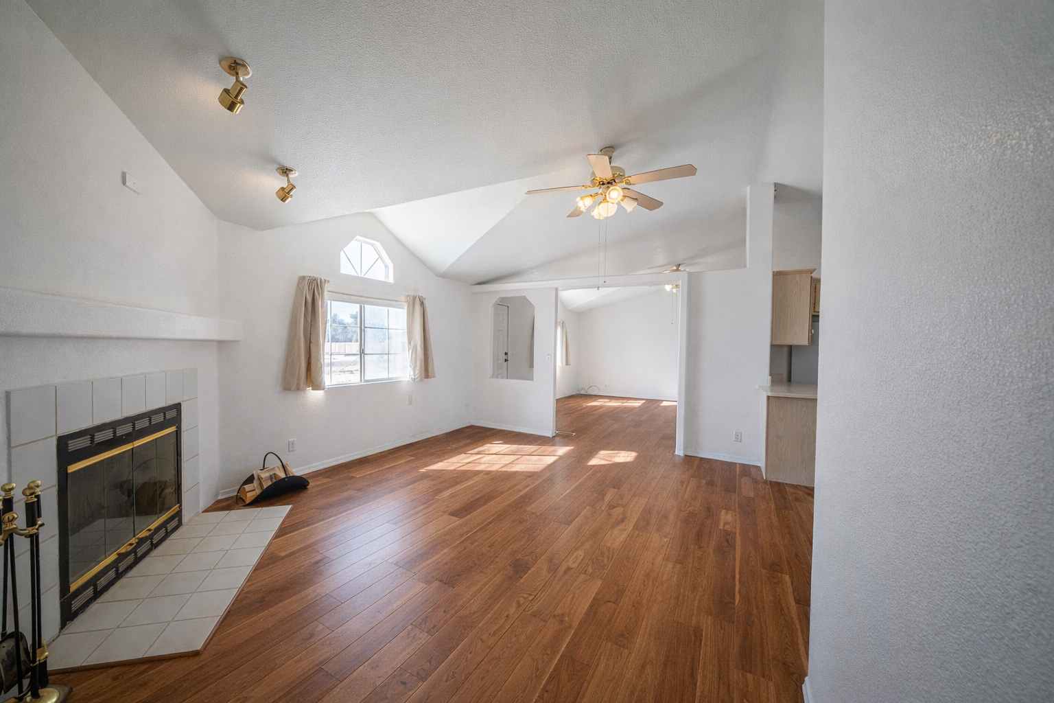 Virtually renovated living room with modern finishes