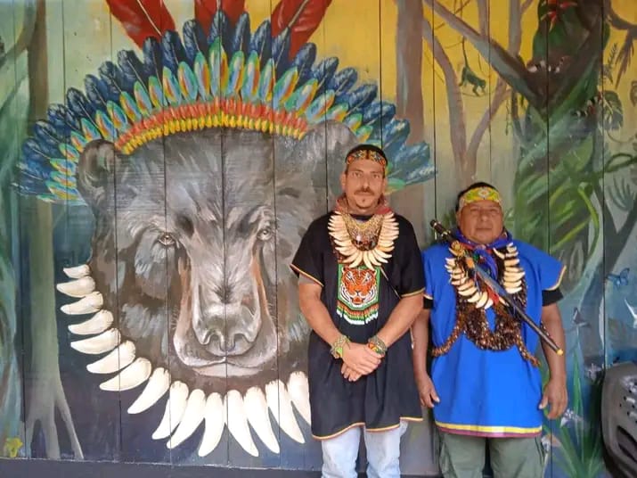Gabriel Guillén and Taita Alirio Causaluzán in ceremonial regalia