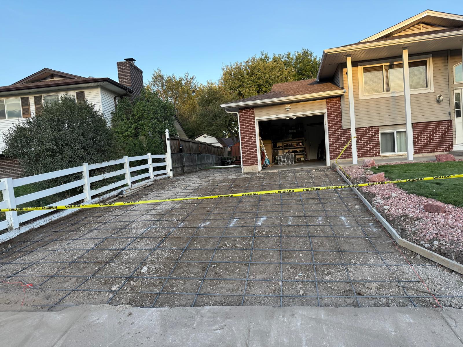 Curved Patio · Stone-Front Home