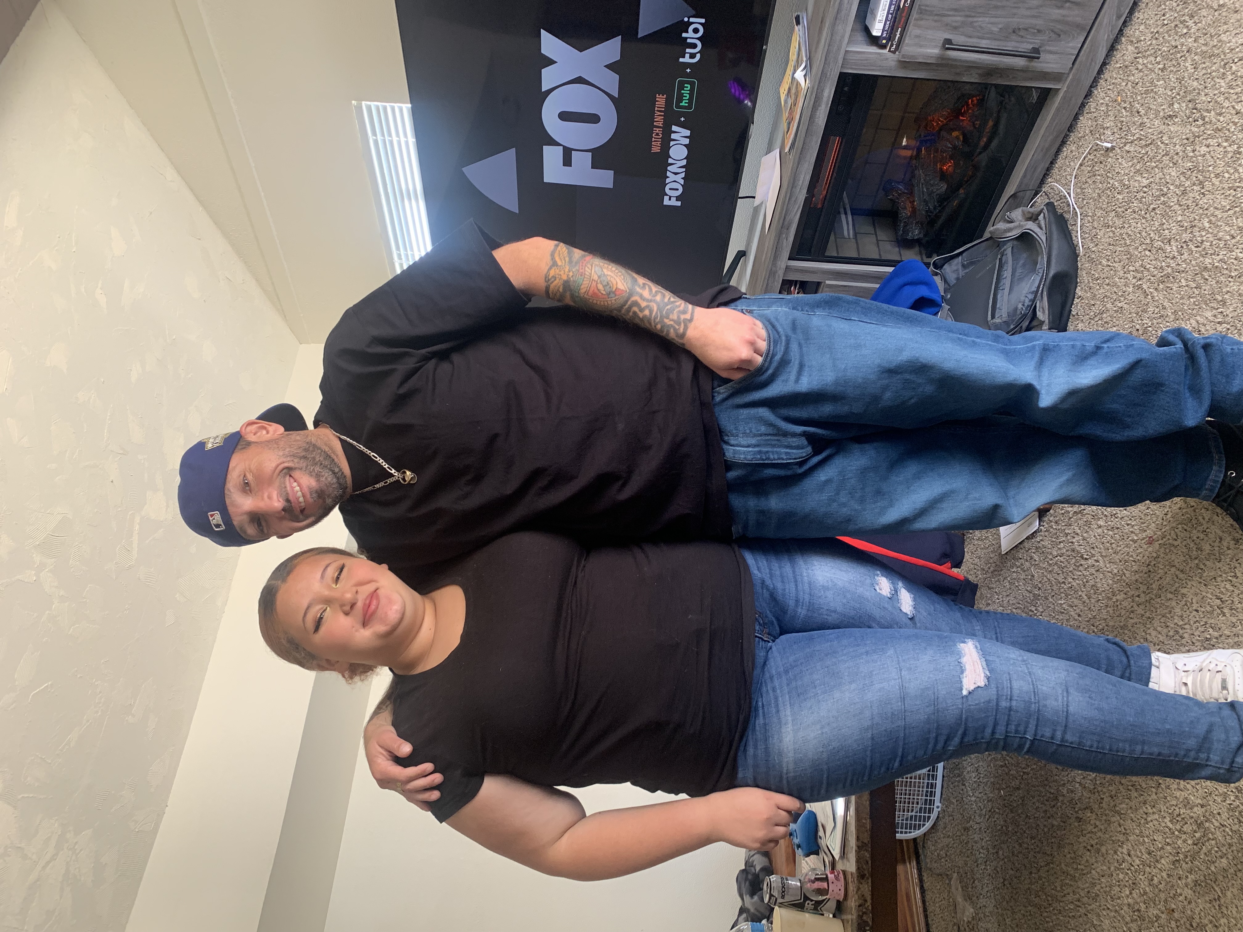 Kevin Fonseca and his daughter Zyann standing together — three generations of the Fonseca family