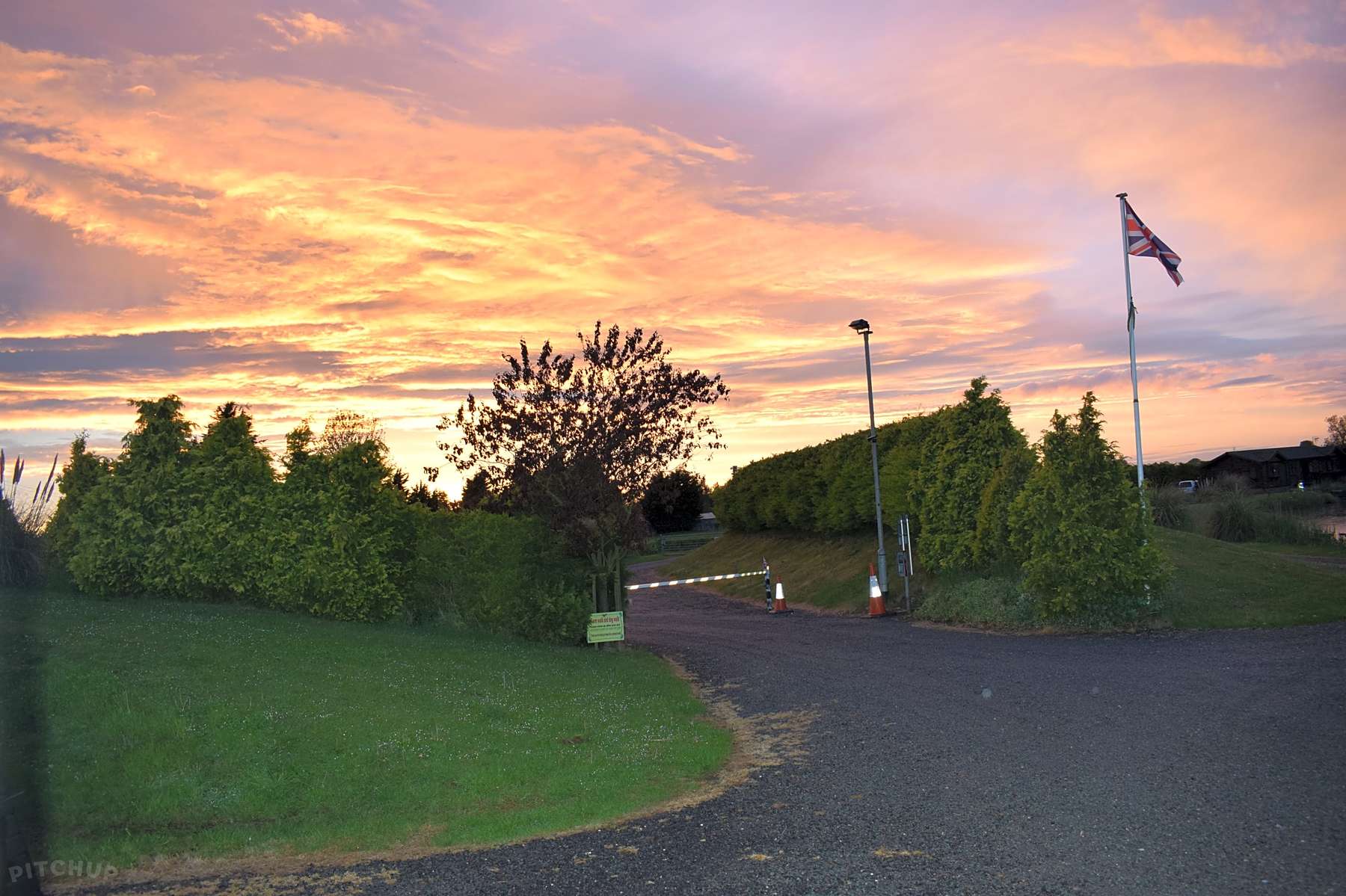 Evening over the camping pitches at Walnut Lakes, an adults-only Lincolnshire campsite