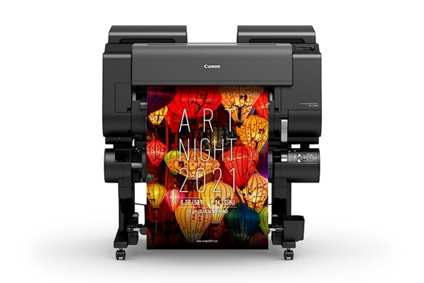 Canon imagePROGRAF wide-format printer producing a vivid, large-scale art print