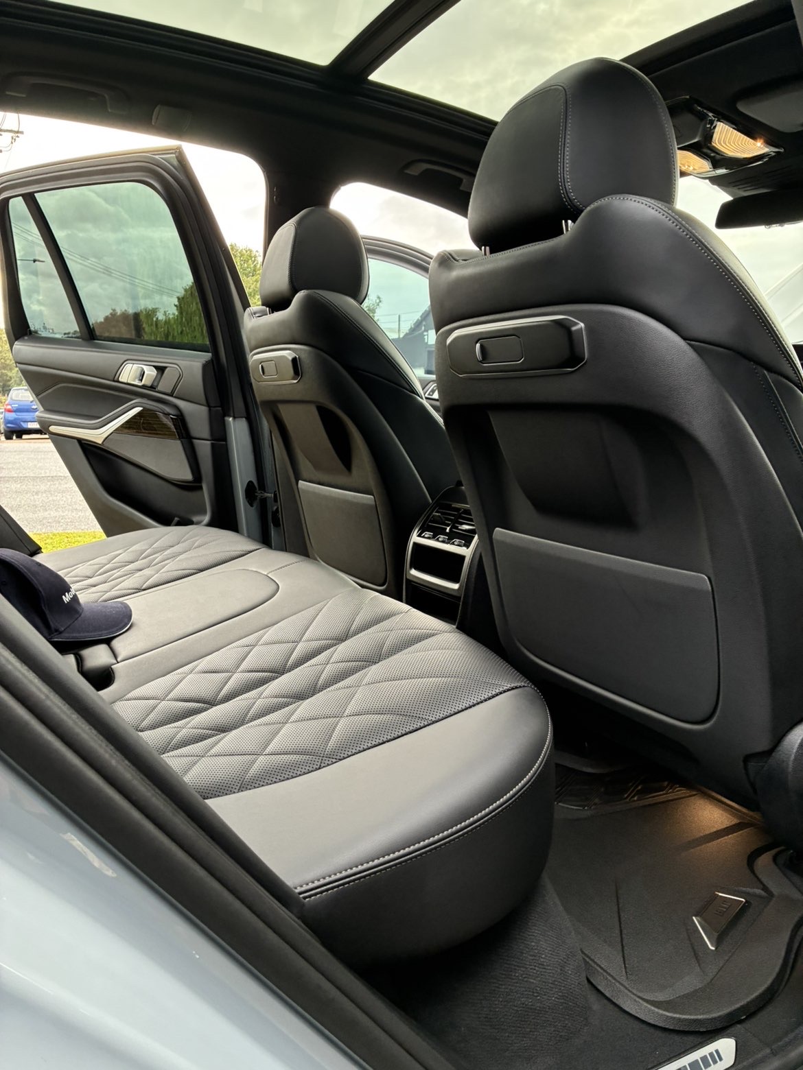 BMW X5 rear seats — diamond stitched leather under panoramic roof