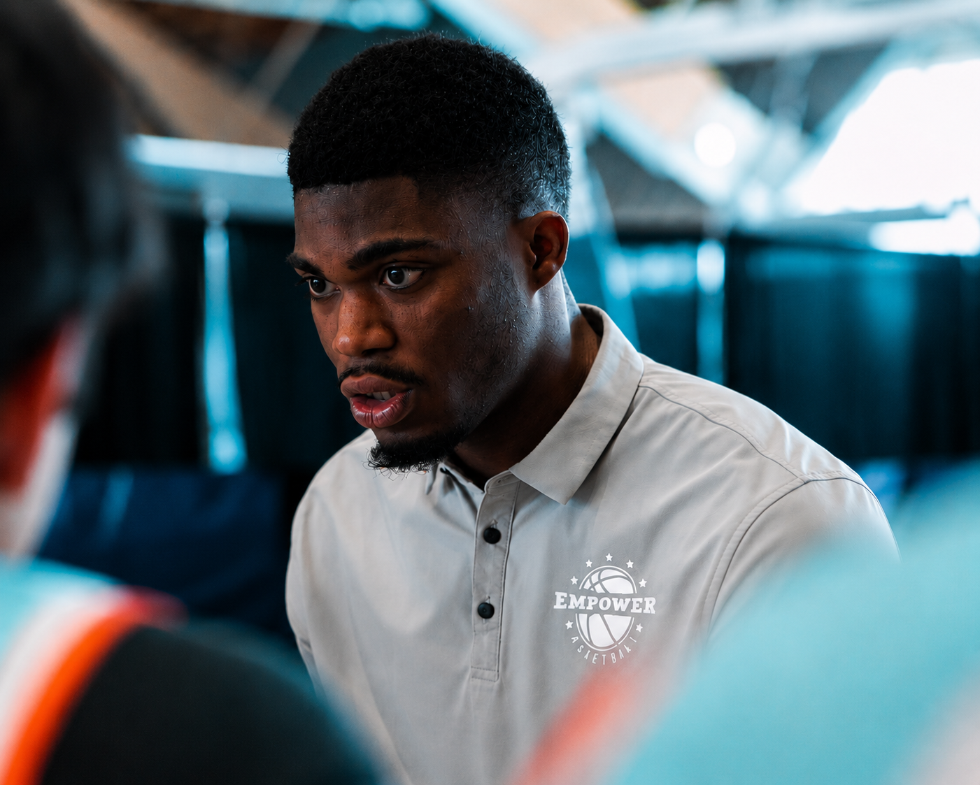 Coach Elete, focused close-up