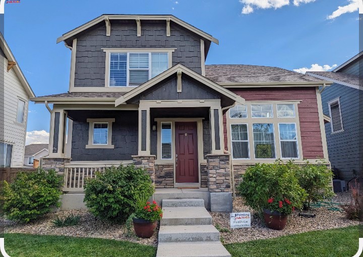 Gray and red exterior house painting