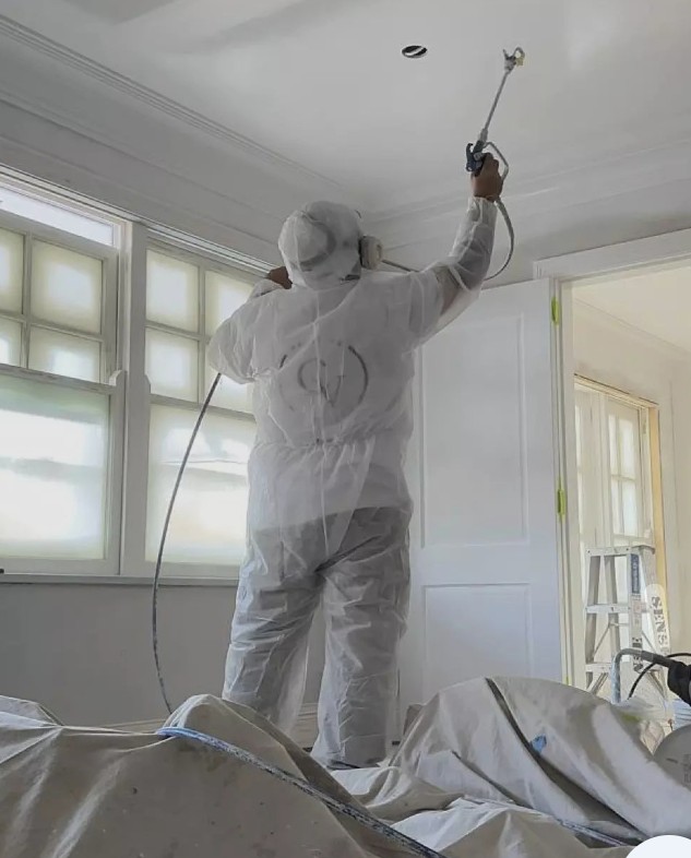 Professional spray painting ceiling