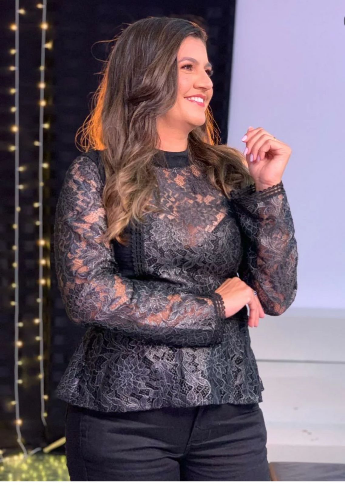 Aloísia Marques, psicóloga clínica, sorrindo em retrato profissional
