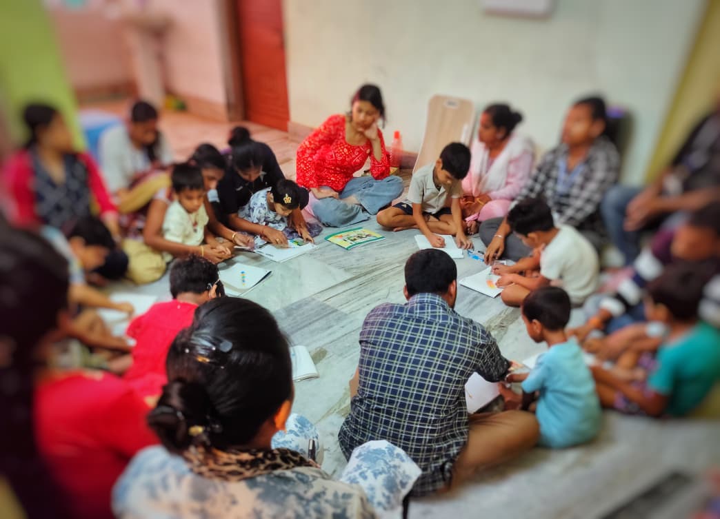 Group therapy session with children and therapists