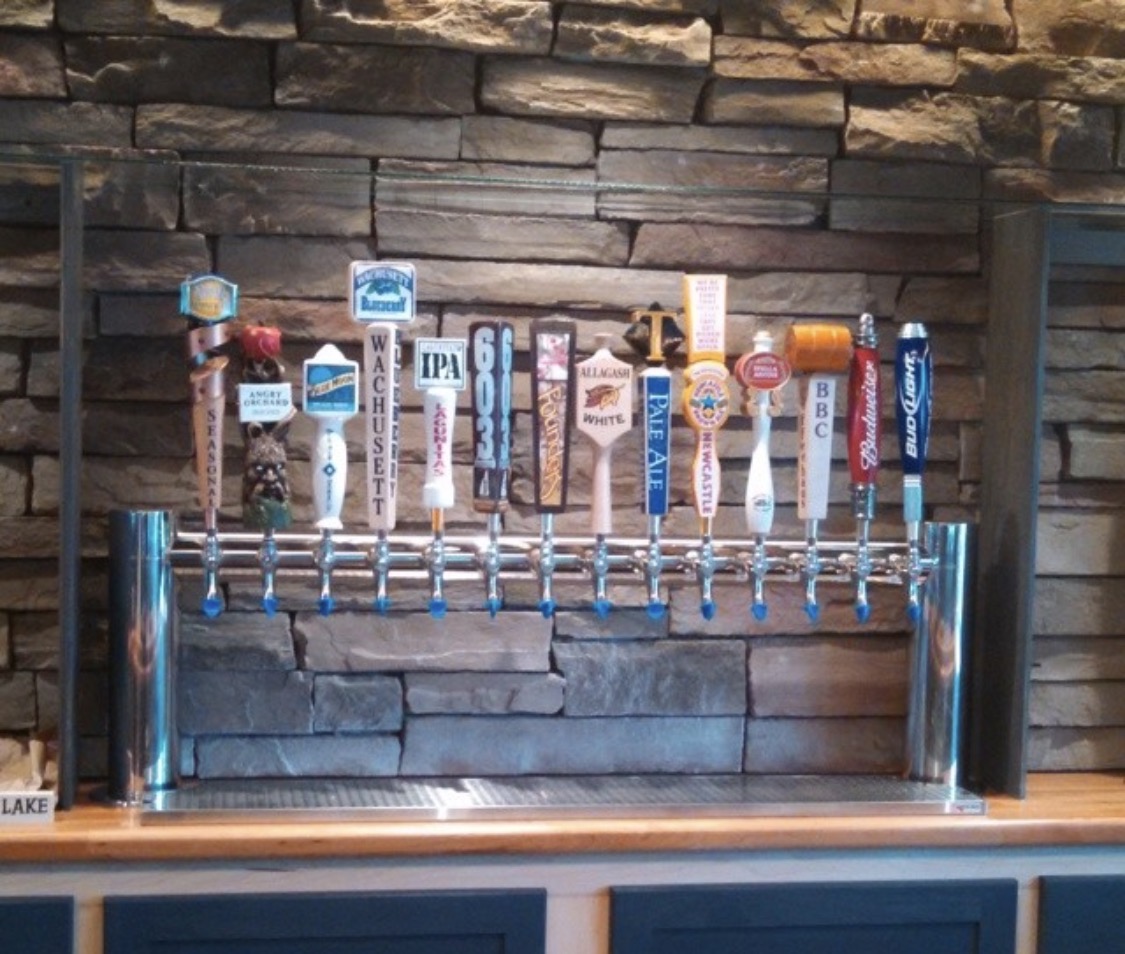 Full tap lineup installation with stone backdrop