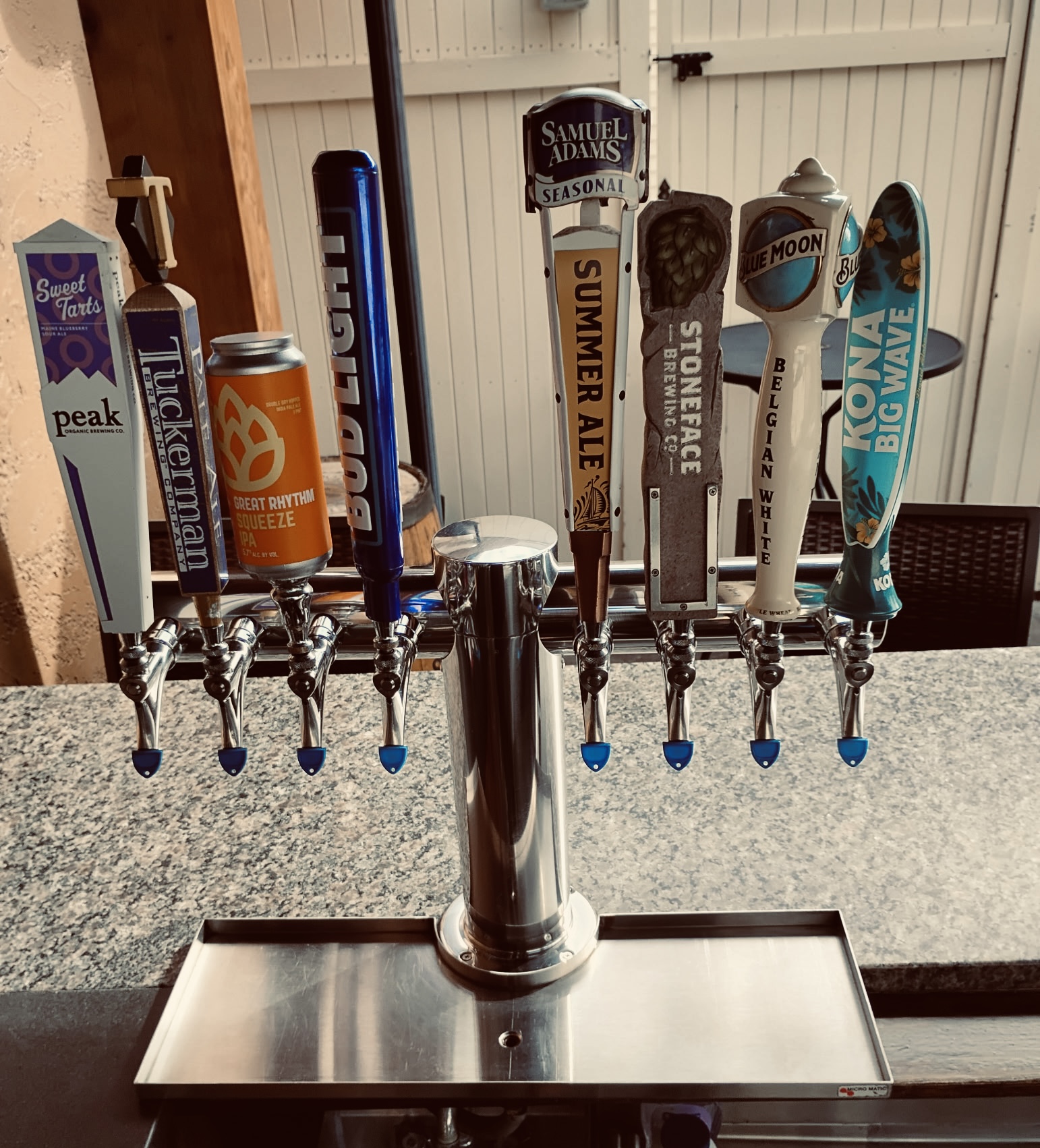 Outdoor patio tap tower with craft beer handles