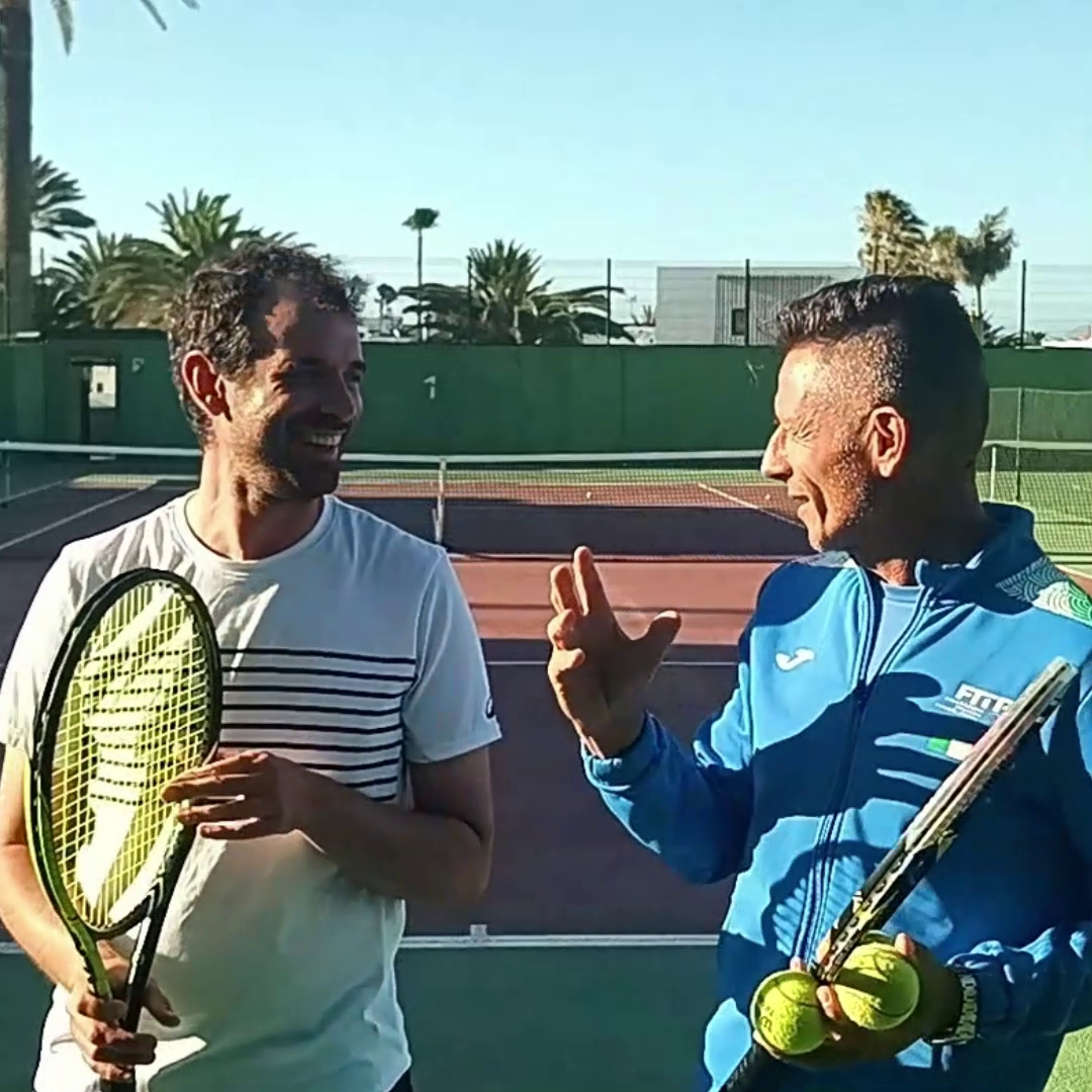 Certified coaching — coach and player on court