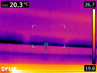 Internal wall surface — uniformly cool reading (18.6 °C) recorded as part of the room-by-room baseline used to compare with warmer reference surfaces in the report