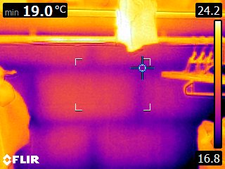 Cold wall mapped against warm radiator and surrounding fabric