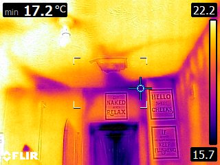 Bathroom external wall — surface clearly below the rest of the room (cold reveal + cold corner) creating an elevated condensation risk on the painted finish