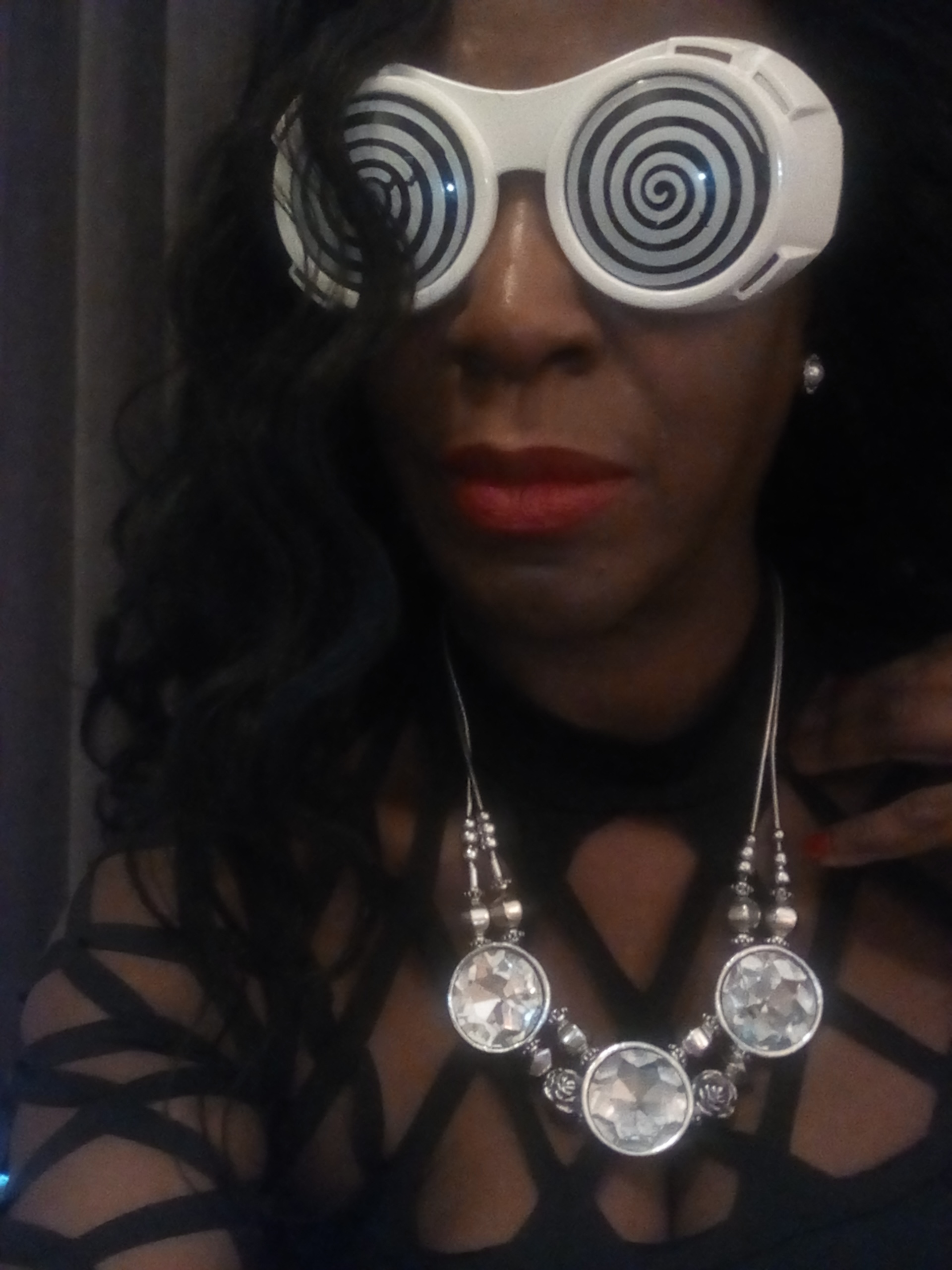 Queen Cleopatra in hypno-spiral glasses