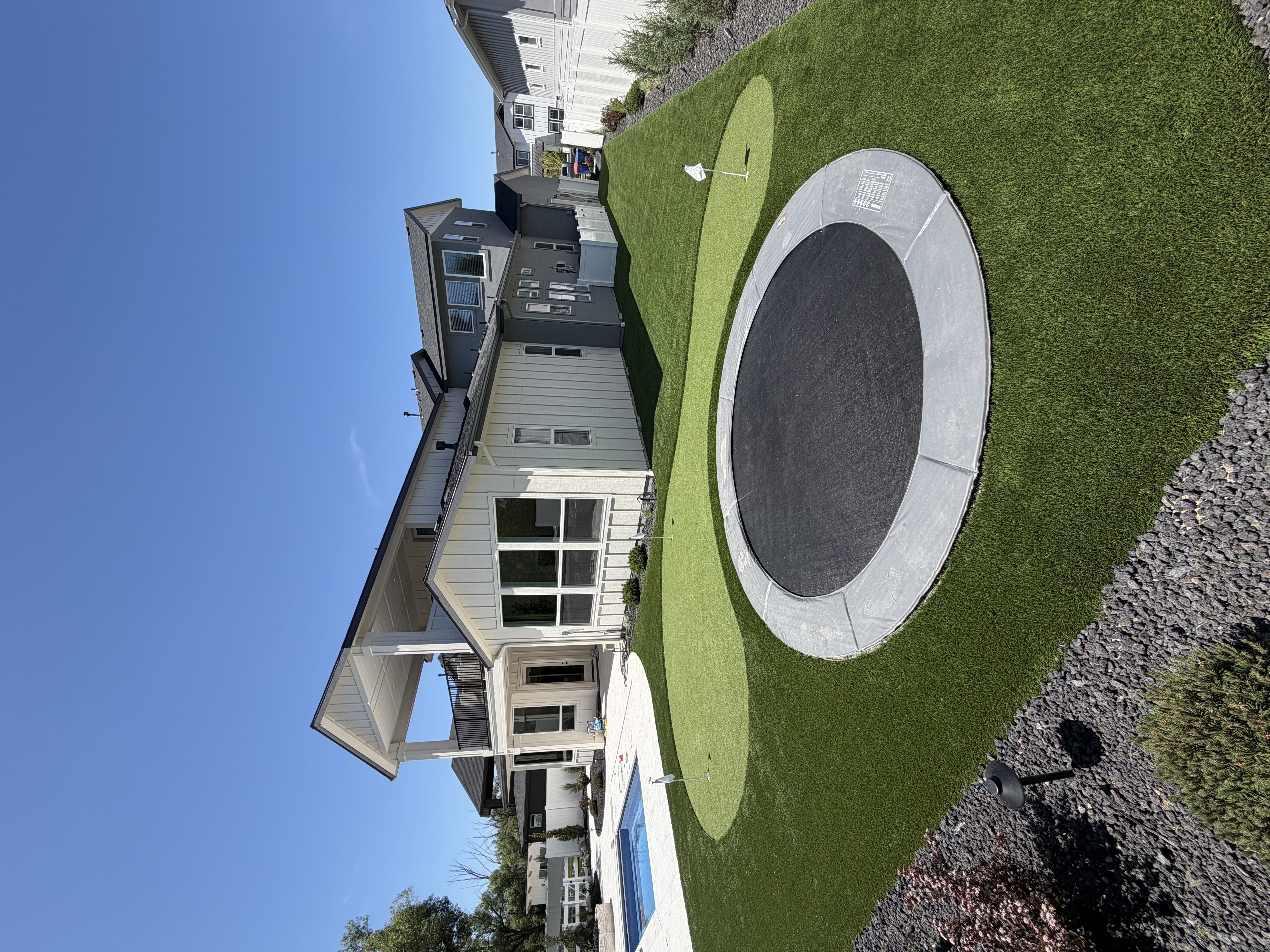 Backyard play area + in-ground trampoline