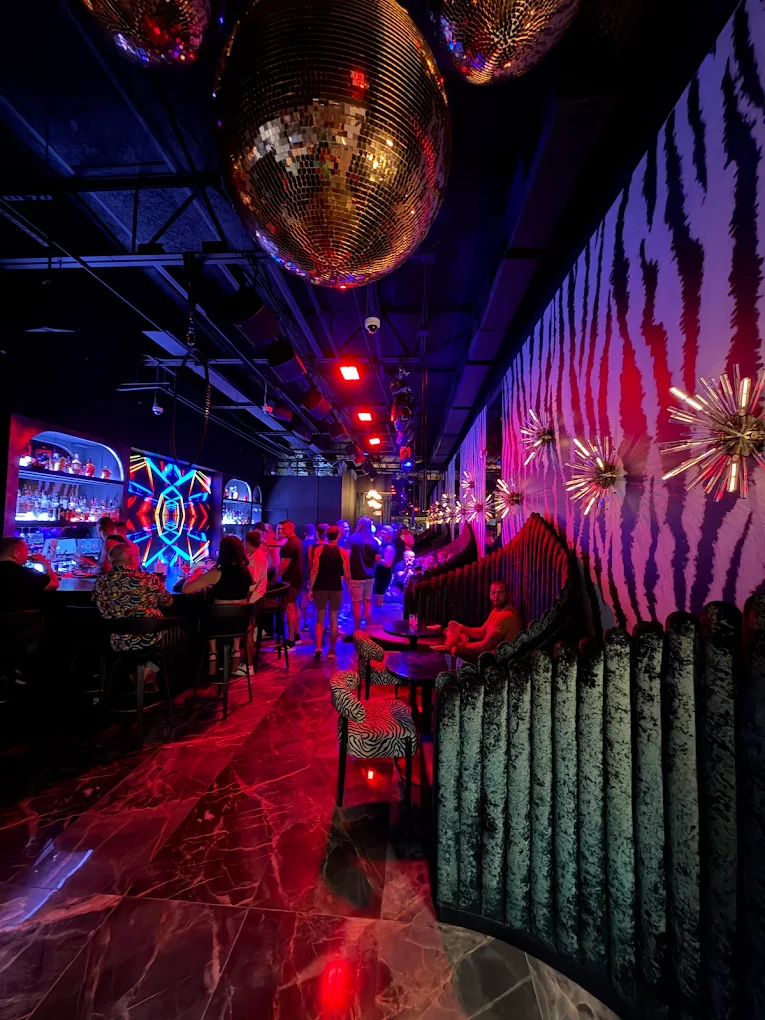 Lounge interior with disco ball and velvet seating