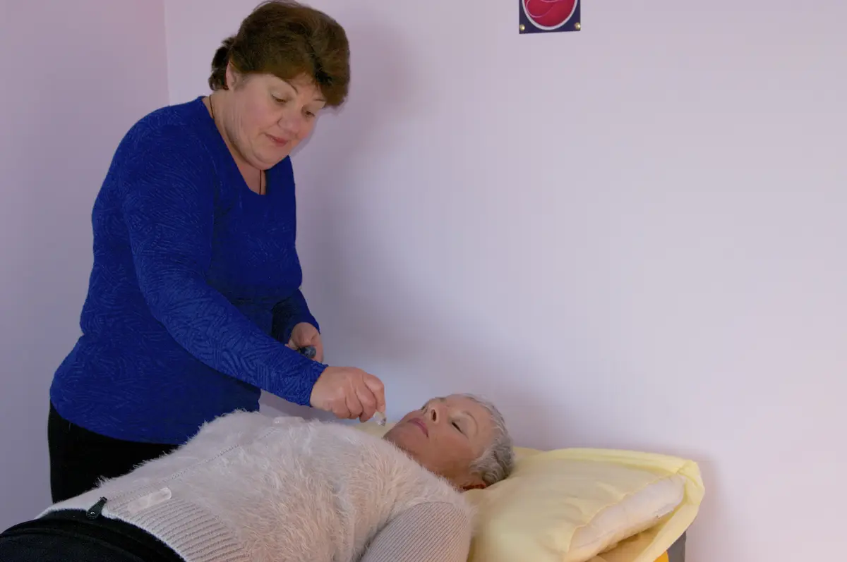 Verna facilitating an energy healing session