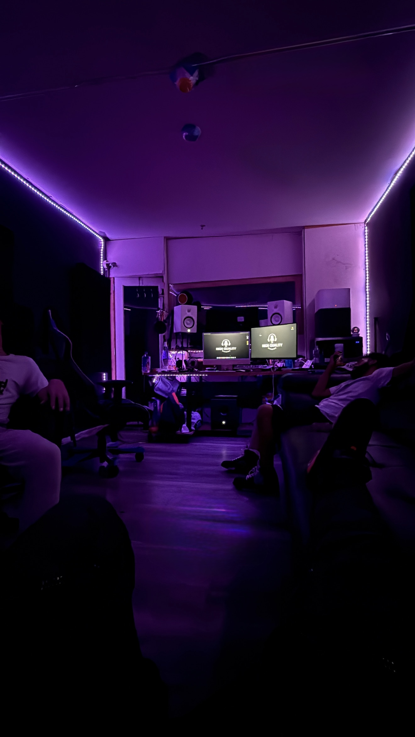 Studio with purple LED lighting and professional setup