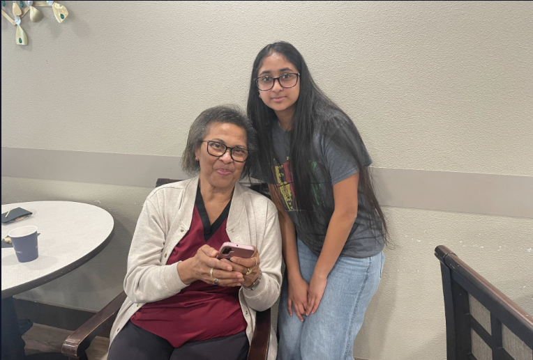 Senior and volunteer together