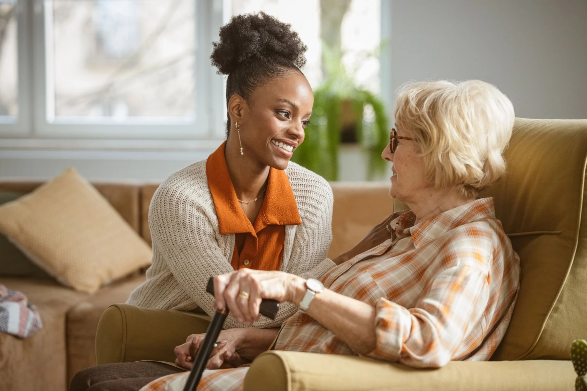 Caregiver with an elderly couple