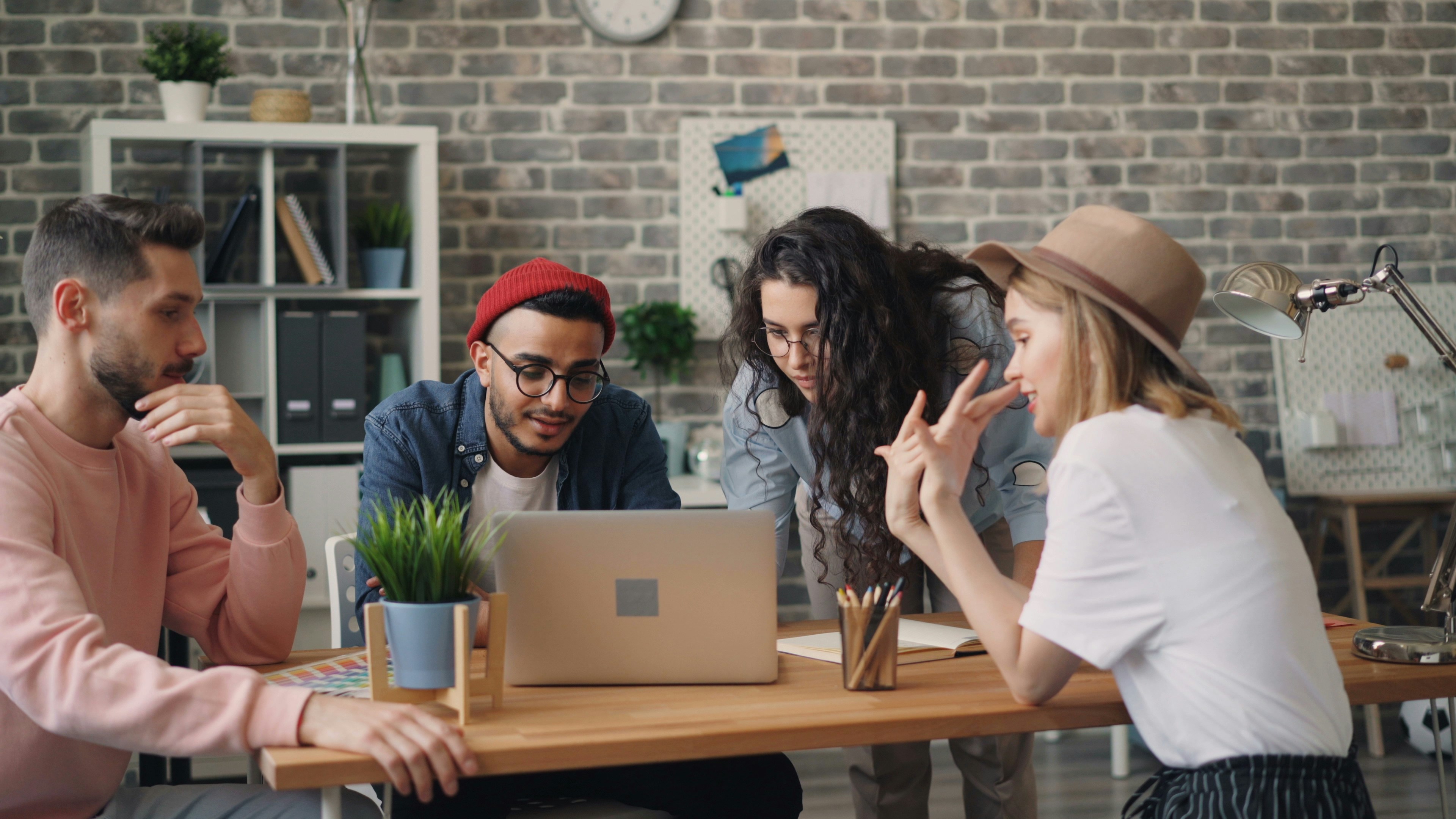 A focused professional reviewing a printed report at her desk — representing the agency owner who reclaimed her Monday mornings through invoice automation.