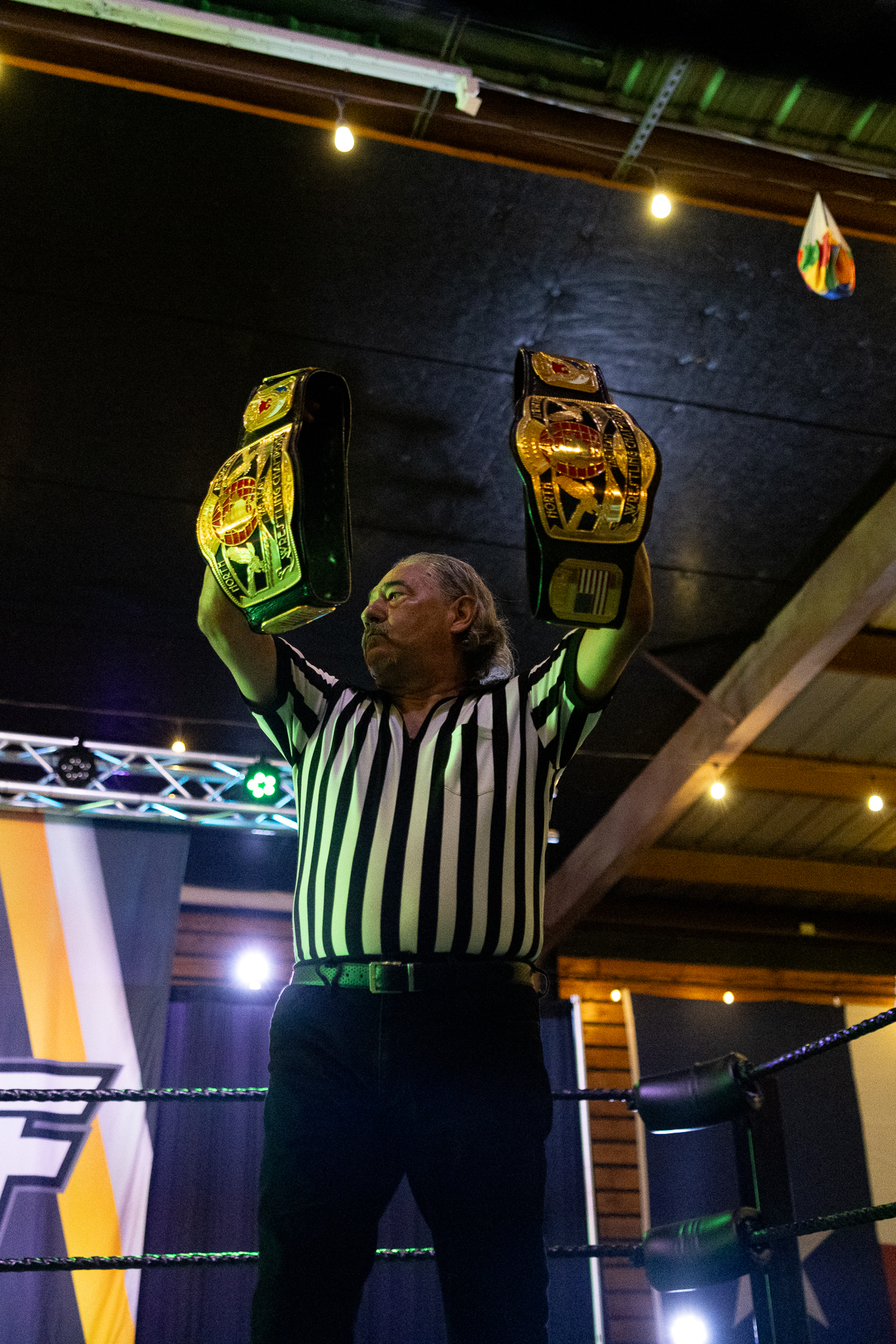 Tag-team gold held high