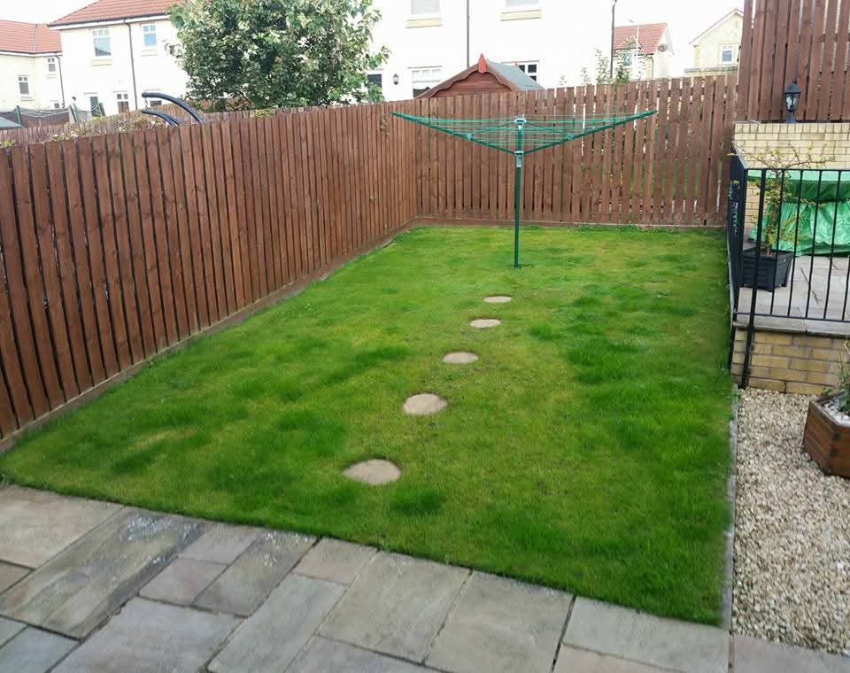 Fenced Lawn with Wooden Edging before