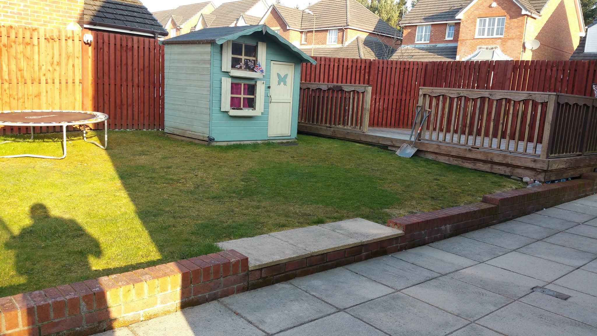 Playhouse & New Lawn before