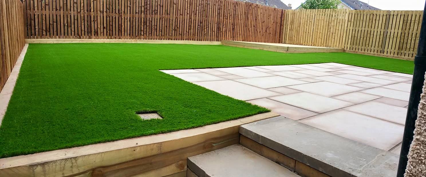 Stone Patio & Lush Lawn