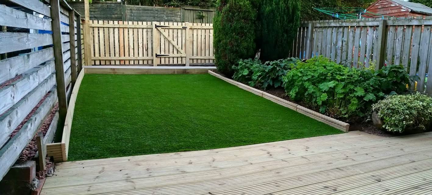 Small Garden with Grey Fence